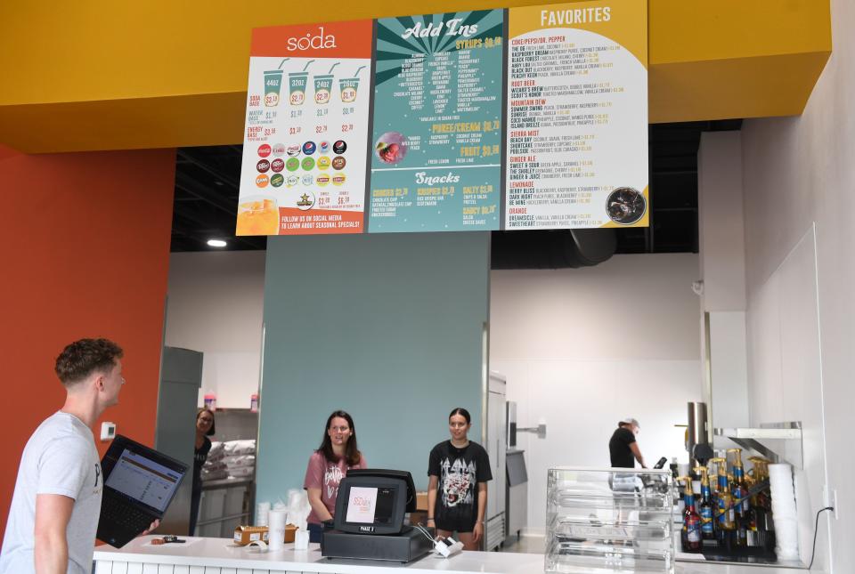 The menu hangs above the counter at SoDak Soda on Thursday, June 30, 2022, in Sioux Falls.