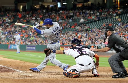 Apr 14, 2016; Houston, TX, USA; Kansas City Royals first baseman Eric Hosmer (35) hits a two run home run against the Houston Astros in the six inning at Minute Maid Park. Thomas B. Shea-USA TODAY Sports
