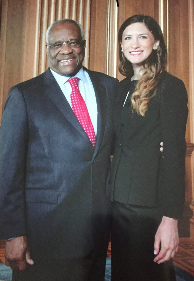 Federal Court Judge and Lakeland native Kathryn Kimball Mizelle with U.S. Supreme Court Justice Clarence Thomas, for whom she clerked.