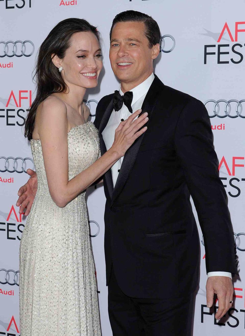 Actors Angelina Jolie and Brad Pitt arrive at the AFI FEST 2015 presented by Audi Opening Night Gala Premiere of Universal Pictures' 'By The Sea' at TCL Chinese 6 Theatres on November 5, 2015 in Hollywood, California