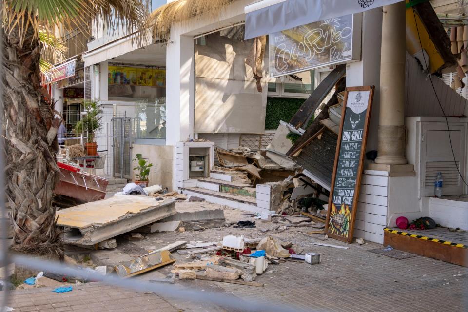 The collapsed restaurant at Playa de Palma beach in Palma de Mallorca (EPA)