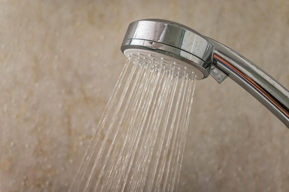 a shower head streaming water