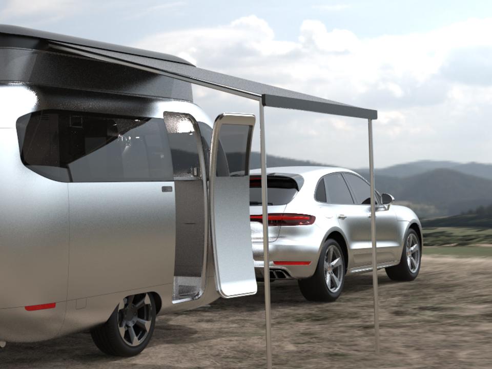 A rendering of the interior of the Airstream Studio F. A. Porsche Concept Travel Trailer next to a vehicle.