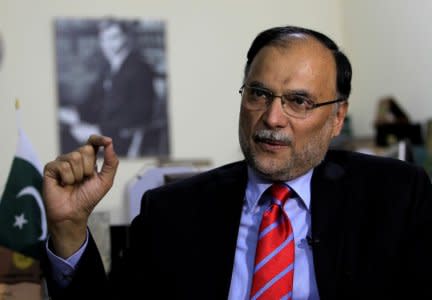 FILE PHOTO: Ahsan Iqbal Pakistan's Minister of Planning and Development speaks with a Reuters correspondent during an interview in Islamabad, Pakistan June 12, 2017. Picture taken June 12, 2017. REUTERS/Caren Firouz/File Photo