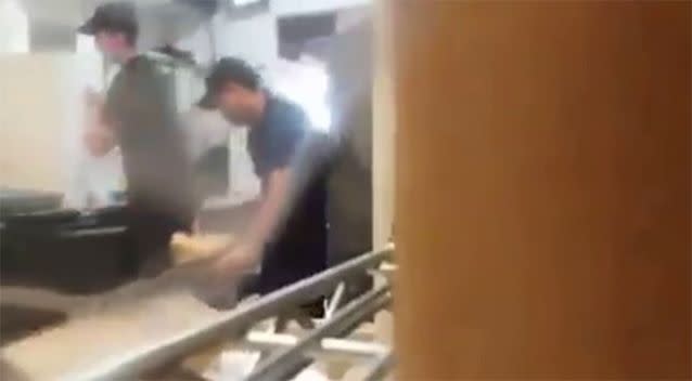 The manager was seen getting bread out of the bin.