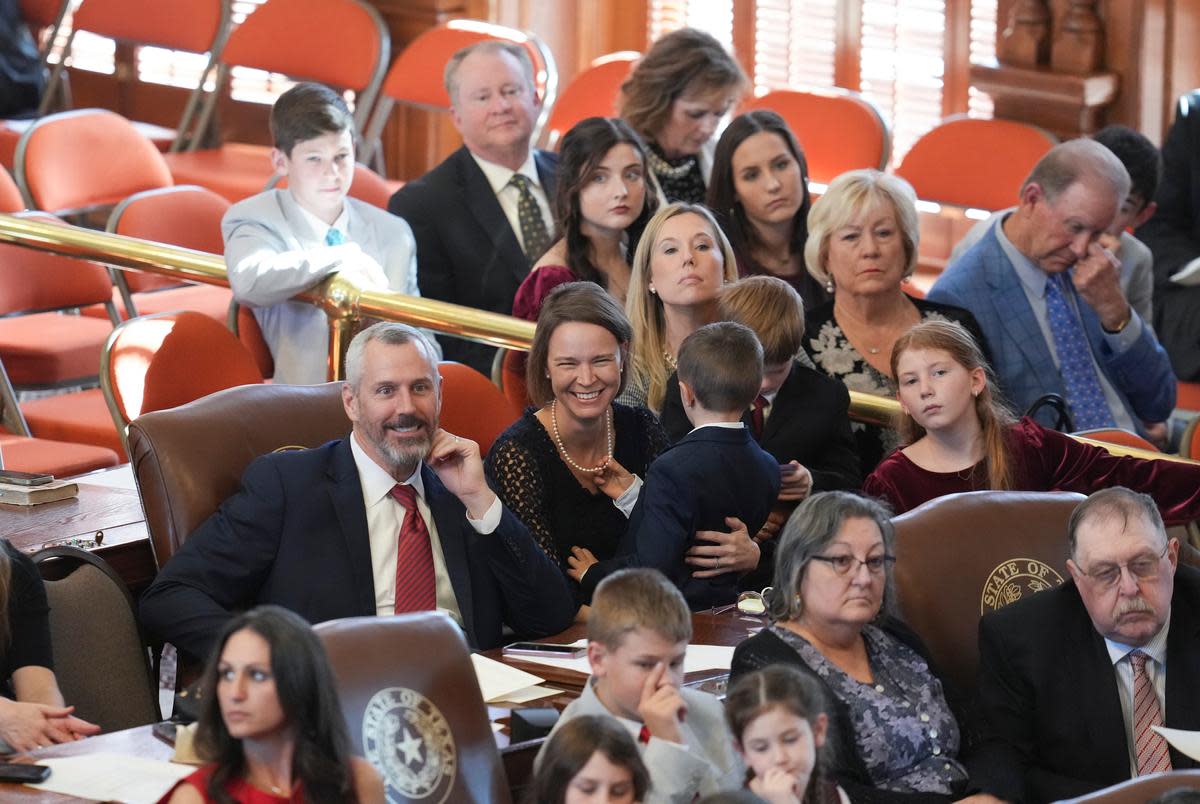 State Rep. Matt Schaefer, R-Tyler, with his family on the House floor on opening day of the 88th Texas Legislature at the Texas Capitol on Jan. 10, 2023.