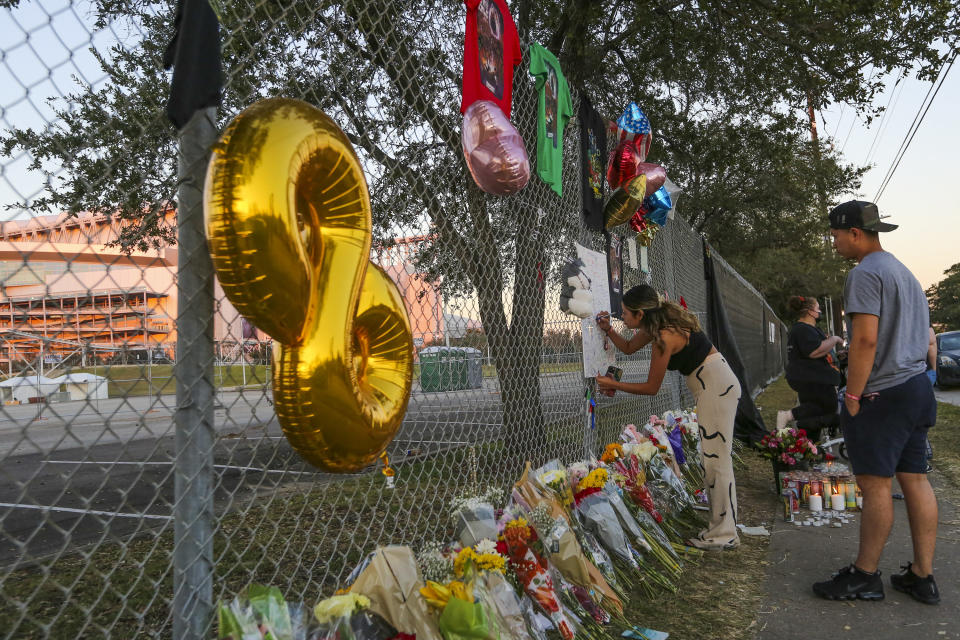 A woman writes on a remembrance board at a makeshift memorial on November 7, 2021 at the NRG Park grounds where eight people died in a crowd surge at the Astroworld Festival in Houston, Texas. - Authorities in Texas opened a criminal investigation Saturday into a tragedy in which the crowd at a huge Travis Scott rap concert surged toward the stage in a crush that killed eight people and sent dozens to the hospital.
Around 50,000 people were in the audience at Houston's NRG Park Friday night when the crowd started pushing toward the stage as Scott was performing, triggering chaotic scenes. (Photo by Thomas Shea / AFP) (Photo by THOMAS SHEA/AFP via Getty Images)