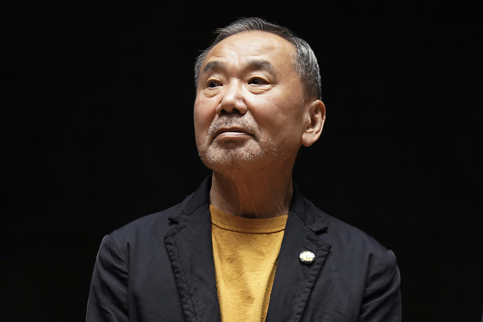 FILE - Japanese novelist Haruki Murakami poses for media members during a news conference on the university's new international house of literature as known as The Haruki Murakami Library at the Waseda University in Tokyo on Sept. 22, 2021. Murakami wrote a story of a walled city when he was fresh off his debut. More than four decades later, as a seasoned and acclaimed novelist, he gave it a new life as “The City and Its Uncertain Walls.” (AP Photo/Eugene Hoshiko, File)