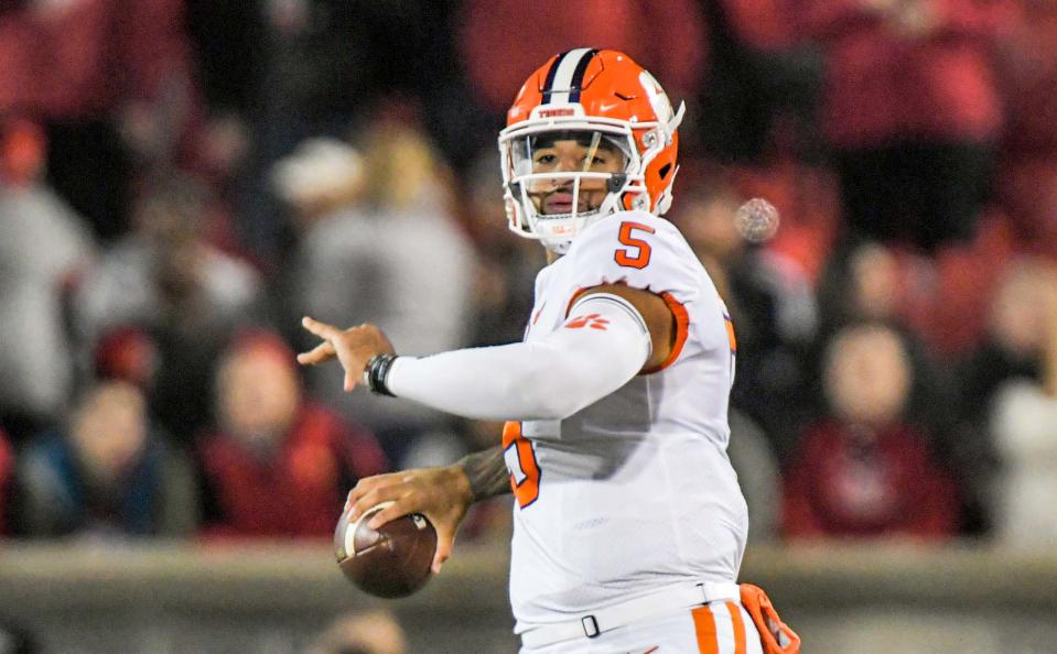 Clemson quarterback D.J. Uiagalelei (5) throws a 46-yard pass to wide receiver Beaux Collins (80) for a touchdown during the first quarter at Cardinal Stadium in Louisville, Kentucky, Nov. 6, 2021.