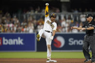 San Diego Padres' Juan Soto reacts after hitting a double during the sixth inning of the team's baseball game against the San Francisco Giants, Tuesday, Aug. 9, 2022, in San Diego. (AP Photo/Gregory Bull)