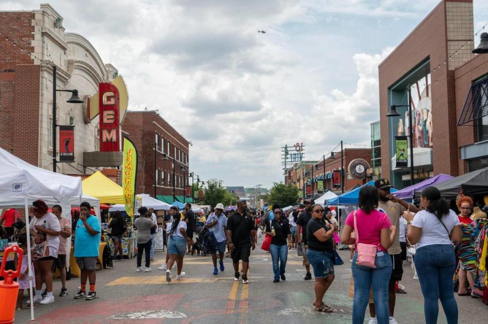 Visitors attend the Juneteenth KC 12th annual Heritage Festival at the18th and Vine district on Saturday, June 17, 2023, in Kansas City.