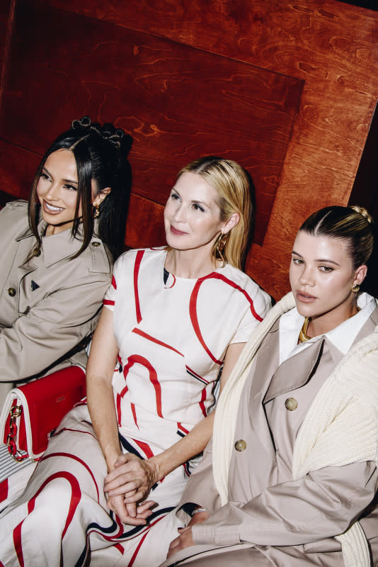 From left to right, Becky G, Kelly Rutherford and Sofia Richie-Grainge sit front row at Tommy Hilfiger.<p>Photo: Nina Westervelt/WWD via Getty Images</p>