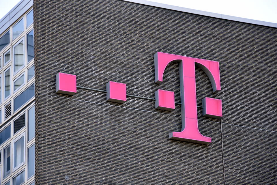 10 April 2020, North Rhine-Westphalia, Cologne: Logo, lettering of the telecommunications company Telekom on a wall Photo: Horst Galuschka/dpa/Horst Galuschka dpa (Photo by Horst Galuschka/picture alliance via Getty Images)
