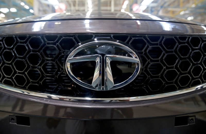 FILE PHOTO: A Tata Tigor car is pictured at the assembly line inside the Tata Motors car plant in Sanand, on the outskirts of Ahmedabad