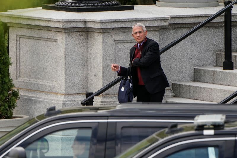 Fauci sits outside the White House before a meeting during the coronavirus disease (COVID-19) break in Washington