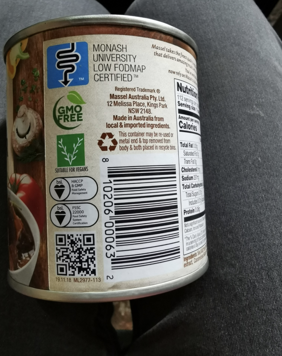 Tin of Massel beef powder stock showing its vegan friendly label.