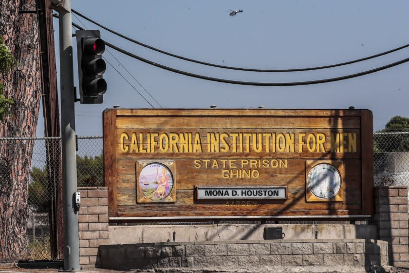 Chino, CA, Tuesday, July 21, 2020 - Outside the California Institute for Men, Chino. The Chino prison reported more than 600 cases of COVID-19 and nine deaths. The 700 inmates selected for transfer had medical conditions that made them especially vulnerable to the virus. (Robert Gauthier / Los Angeles Times)