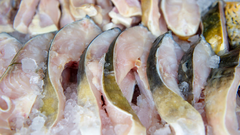 catfish steaks displayed on ice