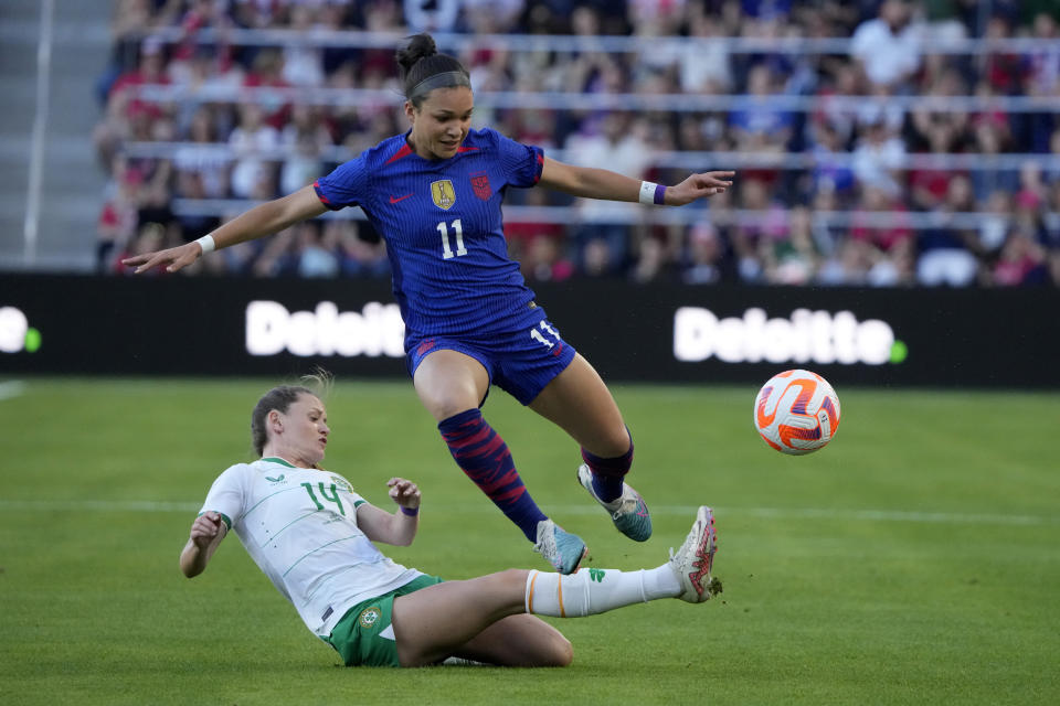 FILE - Ireland's Heather Payne (14) kicks the ball away from United States' Sophia Smith (11) during the first half of an international friendly soccer match Tuesday, April 11, 2023, in St. Louis. (AP Photo/Jeff Roberson, File)