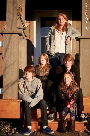 The Senior Family of Boomtowners -- (L-R) Dillon, Miranda, Deanna, Logan, and Sydney -- are pictured in Sidney, Montana in this November 2014 handout photo. REUTERS/Smithsonian Channel/Handout via Reuters