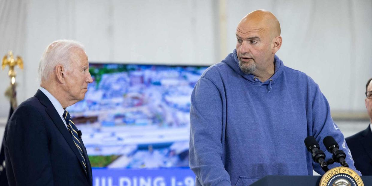 President Joe Biden looks on as Sen. John Fetterman delivers remarks in Philadelphia, Pennsylvania on June 17, 2023.