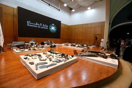 Remains of the missiles which Saudi government says were used to attack an Aramco oil facility, are displayed during a news conference in Riyadh