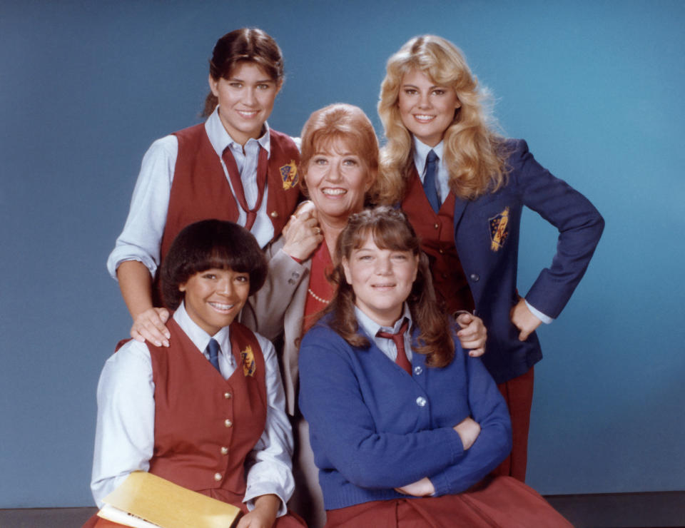 The<em> Facts of Life</em> cast (clockwise from top left): Nancy McKeon, Lisa Whelchel, Mindy Cohn, Kim Fields, and (center) Charlotte Rae. (Photo: Herb Ball/NBCU Photo Bank)