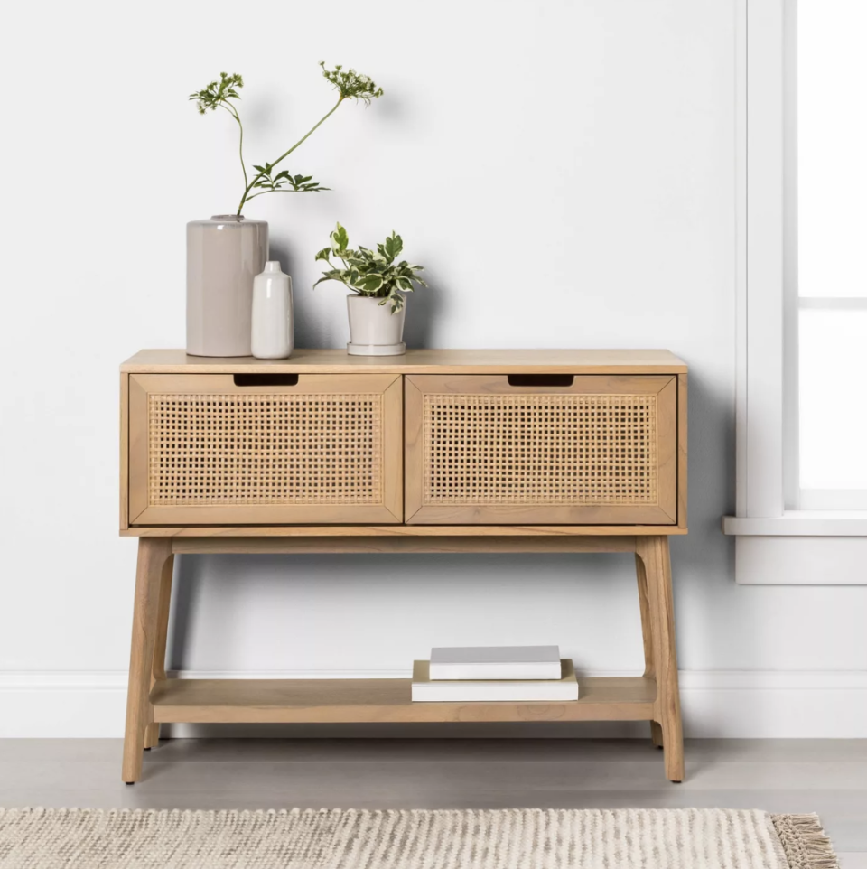 Wood & Cane Console Table with Pull-Down Drawers (Credit: Target)