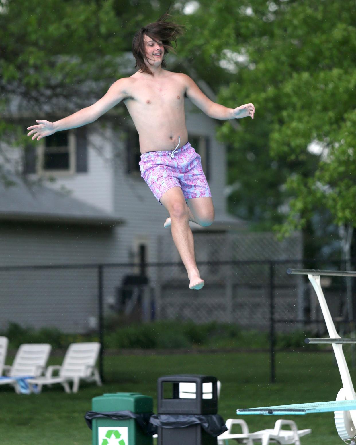 Cole Rembielak catches some air after going off the diving board at Dogwood Pool in North Canton. Dogwood is one of the Stark County locations slated to get funding in Ohio's capital budget.