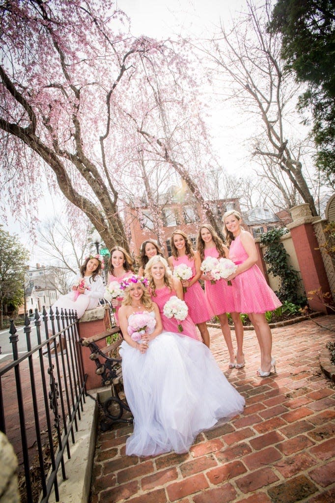 Blakemore wore a flower crown and her bridesmaids wore pink on her wedding day.