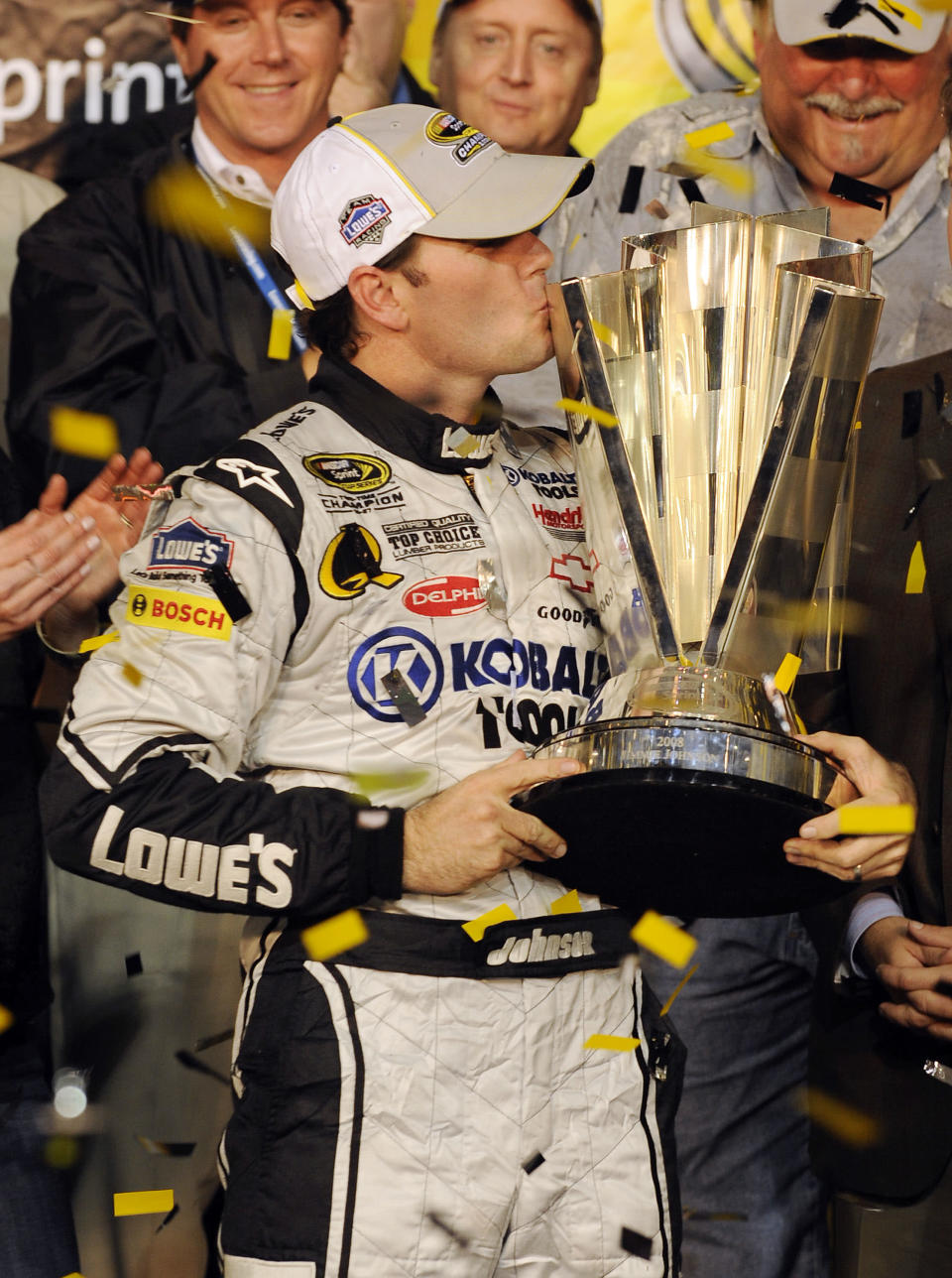 Jimmie Johnson, driver of the #48 Lowe's/Kobalt Tools Chevrolet, celebrates after winning the 2008 NASCAR Sprint Cup Series Championship after racing in the NASCAR Sprint Cup Series Ford 400 at Homestead-Miami Speedway on November 16, 2008 in Homestead, Florida. (Photo by Sam Greenwood/Getty Images for NASCAR)