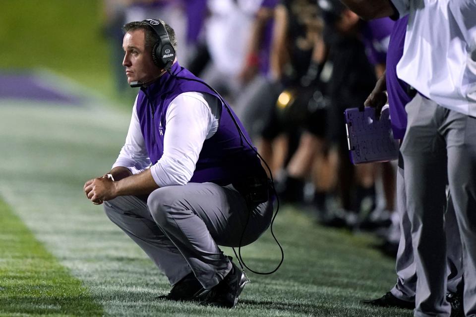 Northwestern coach Pat Fitzgerald watches during the second half of the team's NCAA college football game against Michigan State in Evanston, Ill., Friday, Sept. 3, 2021. Michigan State won 38-21.