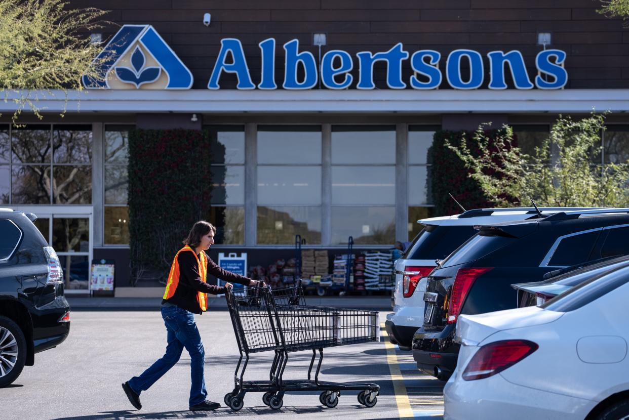 Kroger and Albertsons announced Monday they’ve expanded their deal to sell off hundreds of stores as part of their $25 billion proposal to merge.