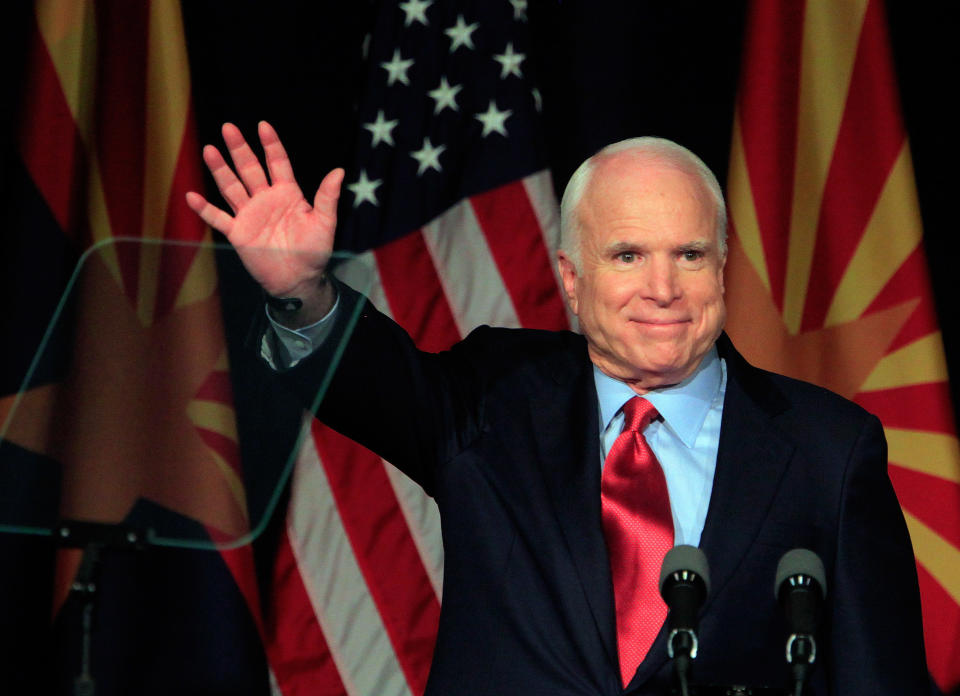John McCain waving