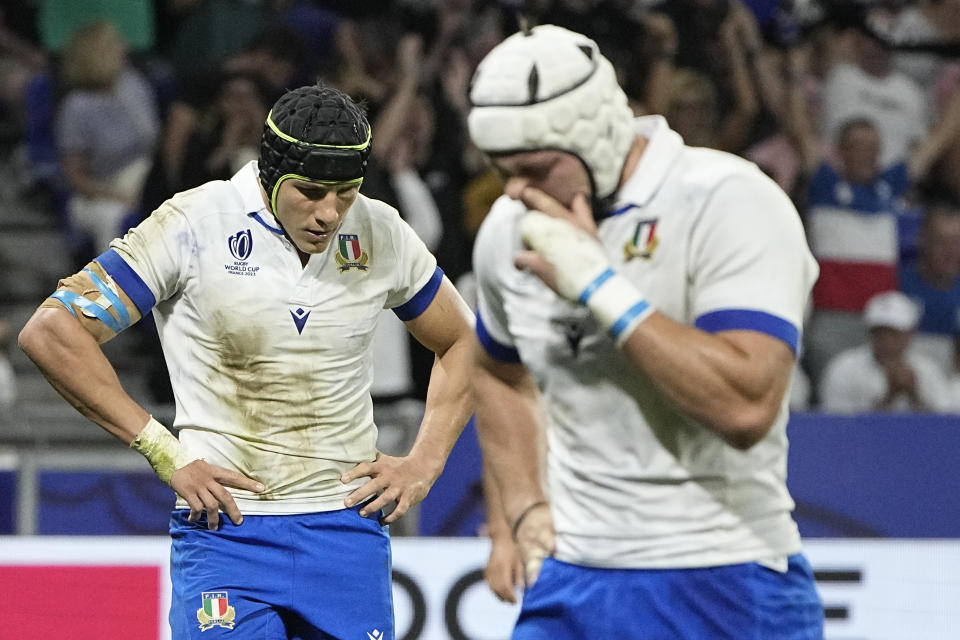 Italian players react during the Rugby World Cup Pool A match between New Zealand and Italy at the OL Stadium in Lyon, France, Friday, Sept. 29, 2023. (AP Photo/Laurent Cipriani)