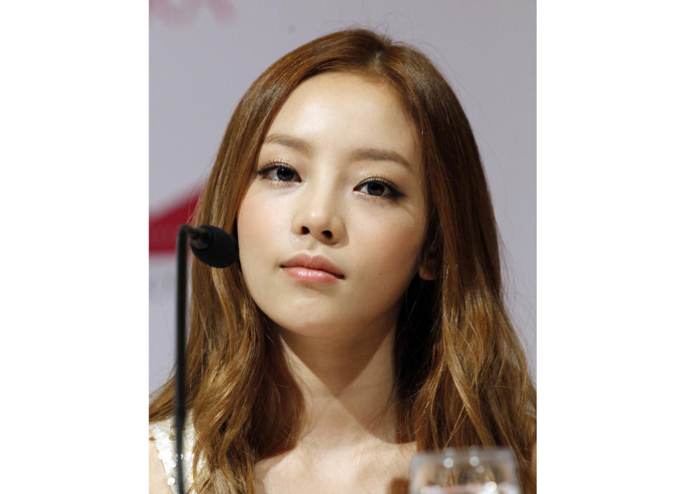 South Korean singer Goo Hara appears at a press conference in Singapore on July 10, 2012. Hara was found dead in her home on Nov. 24. She was 28. (AP Photo/Wong Maye-E, File)
