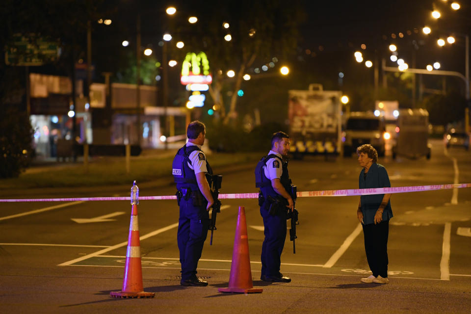 Police speak to a resident as they cordon off Linwood Avenue near the Linwood Masjid on March 15, 2019 in Christchurch, New Zealand. 49 people have been confirmed dead and more than 20 are injured following attacks at two mosques in Christchurch. Four people are in custody following shootings at Al Noor mosque on Dean's Road and the Linwood Masjid in Christchurch. Mosques across New Zealand have been closed and police are urging people not to attend Friday prayers as a safety precaution. (Photo: Kai Schwoerer/Getty Images)