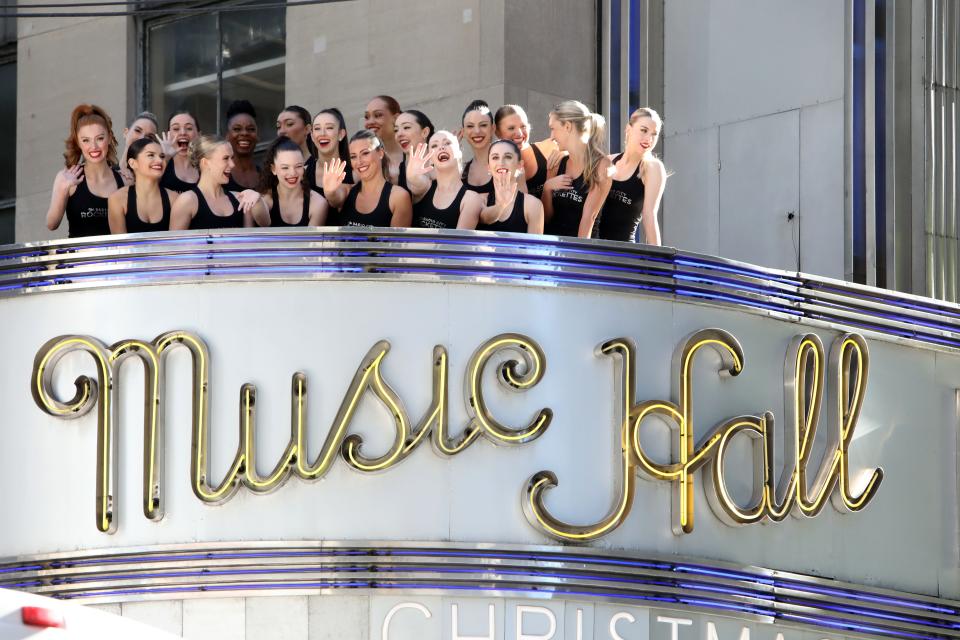 The 18 first-time Rockettes are introduced to the media atop the Art Deco marquee of Radio City Music Hall on Oct. 6, 2022. Seventeen of the 18 came through the Rockettes Conservatory.