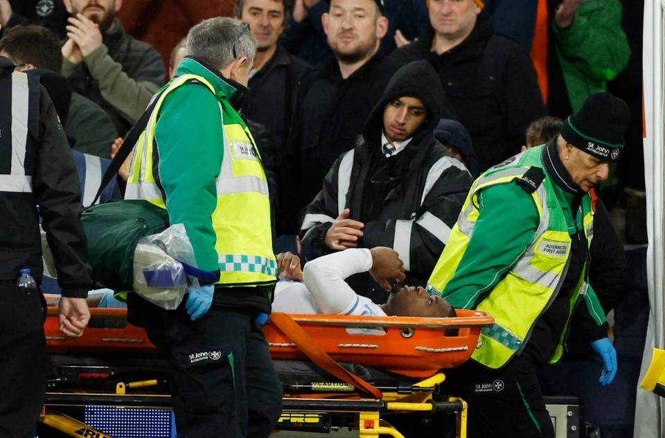 Big blow: Doucoure was stretchered off at Luton (Action Images via Reuters)