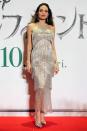 <p>For the Japan premiere, where she was reunited with her son Maddox who is at university in South Korea, Jolie opted for sparkly silver, owning the red carpet in this Ralph & Russo flapper-style fringe halter dress. </p>