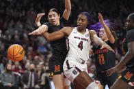 South Carolina forward Aliyah Boston (4) battles for a rebound against Maryland forward Mimi Collins, left, and Katie Benzan (11) during the second half of an NCAA college basketball game Sunday, Dec. 12, 2021, in Columbia, S.C. (AP Photo/Sean Rayford)