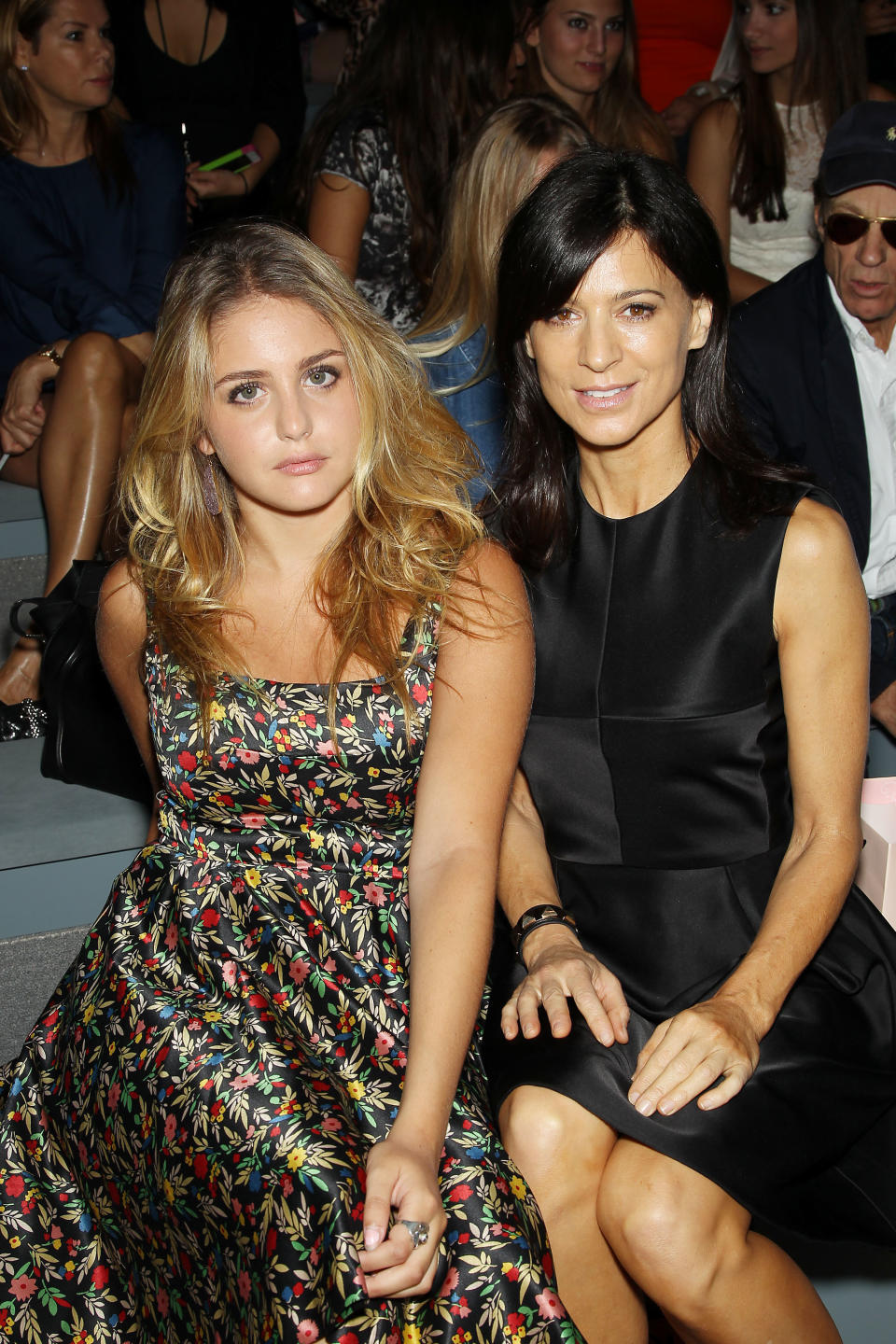 This image released by Starpix shows Sophie Curtis, left, and Perrey Reeves attending the Jill Stuart Spring 2014 show during Fashion Week in New York, Saturday, Sept. 7, 2013. (AP Photo/Starpix, Marion Curtis)