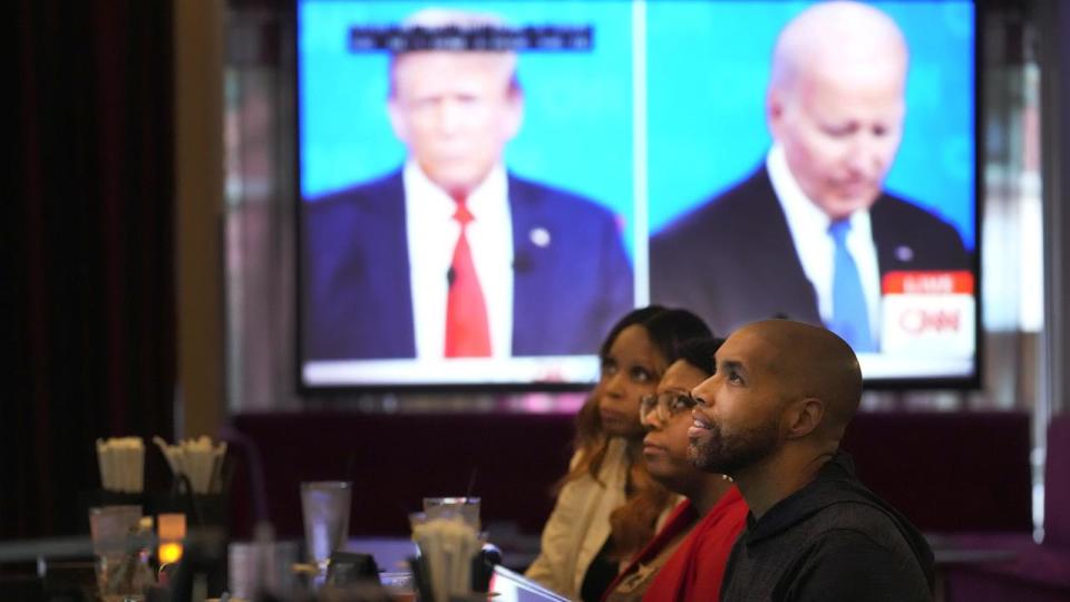 People watch the presidential debate in Chicago