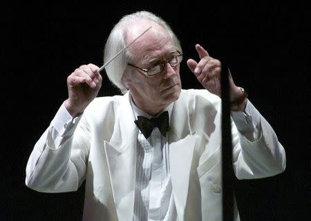 Sir George Martin conducts the Hollywood Bowl Orchestra with a program of music by the Beatles in this June 25 file photo at the Hollywood Bowl in Hollywood. REUTERS/Fred Prouser/Files