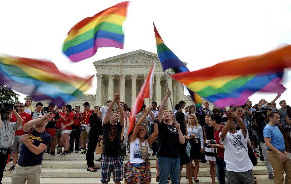 People celebrate outside the Supreme Court after the court legalized same-sex marriage in 2015. But in 2022, Justice Clarence Thomas said the court should “reconsider” its same-sex marriage ruling and other decisions that, like the abortion case, relate to fundamental privacy rights.