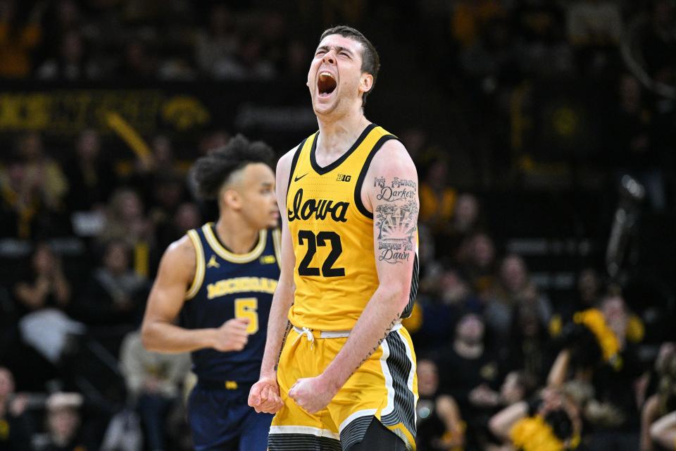 Dec 10, 2023; Iowa City, Iowa, USA; Iowa Hawkeyes forward Patrick McCaffery (22) reacts during the first half against the Michigan Wolverines at Carver-Hawkeye Arena. Mandatory Credit: Jeffrey Becker-USA TODAY Sports