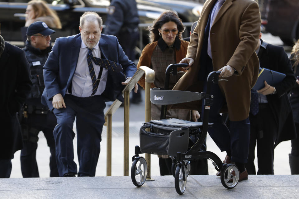 Harvey Weinstein arrives at a Manhattan courthouse for his rape trial in New York, Friday, Feb. 14, 2020. (AP Photo/Seth Wenig)