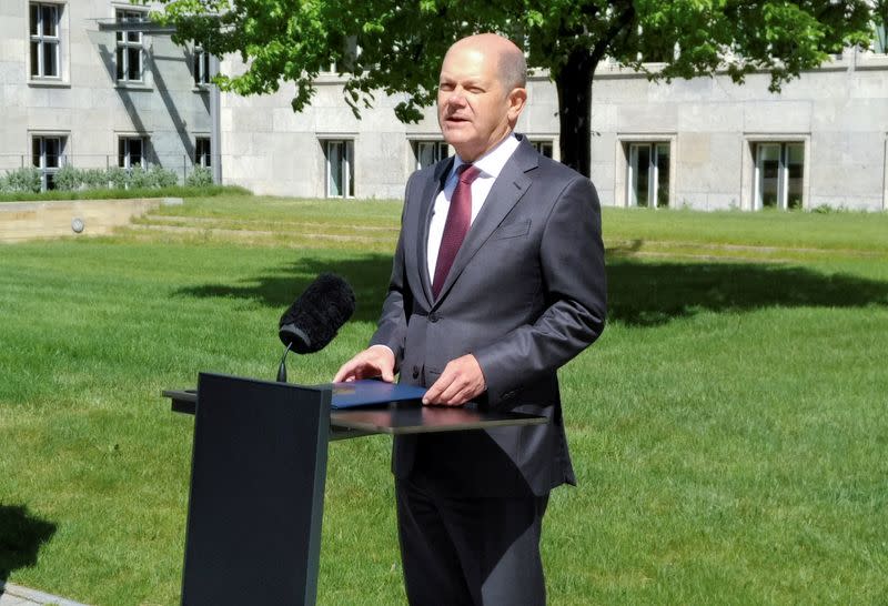 German Finance Minister Olaf Scholz gives a statement in the yard of the finance ministry during the spread of the coronavirus disease (COVID-19) in Berlin