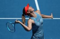 Tennis - Australian Open - Fourth Round - Melbourne Park, Melbourne, Australia, January 20, 2019. Russia's Maria Sharapova in action during the match against Australia's Ashleigh Barty. REUTERS/Lucy Nicholson