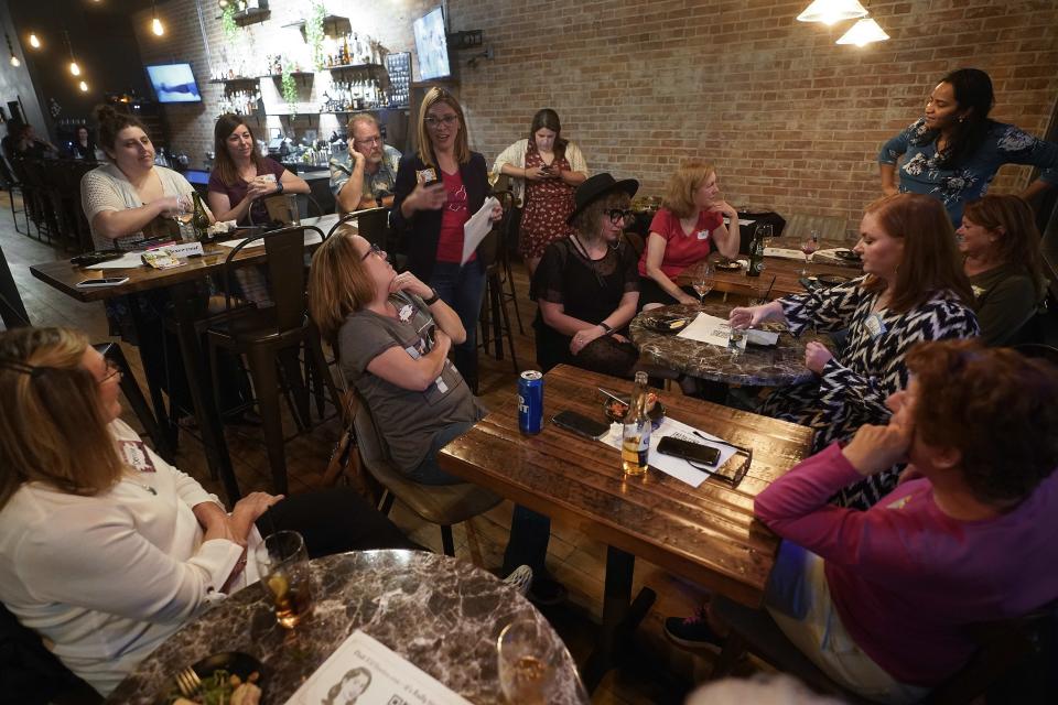 Kelly Dillaha talks during a Red Wine and Blue event in Utica, Mich., Tuesday, Sept. 20, 2022. (AP Photo/Paul Sancya)